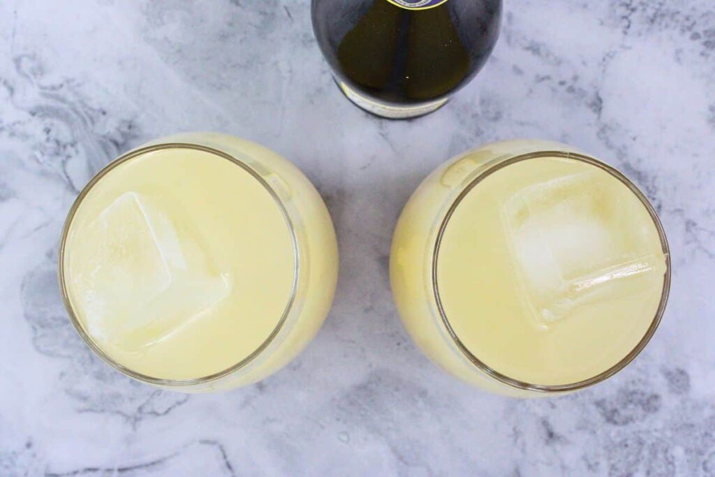add ice and top pear spritz with prosecco