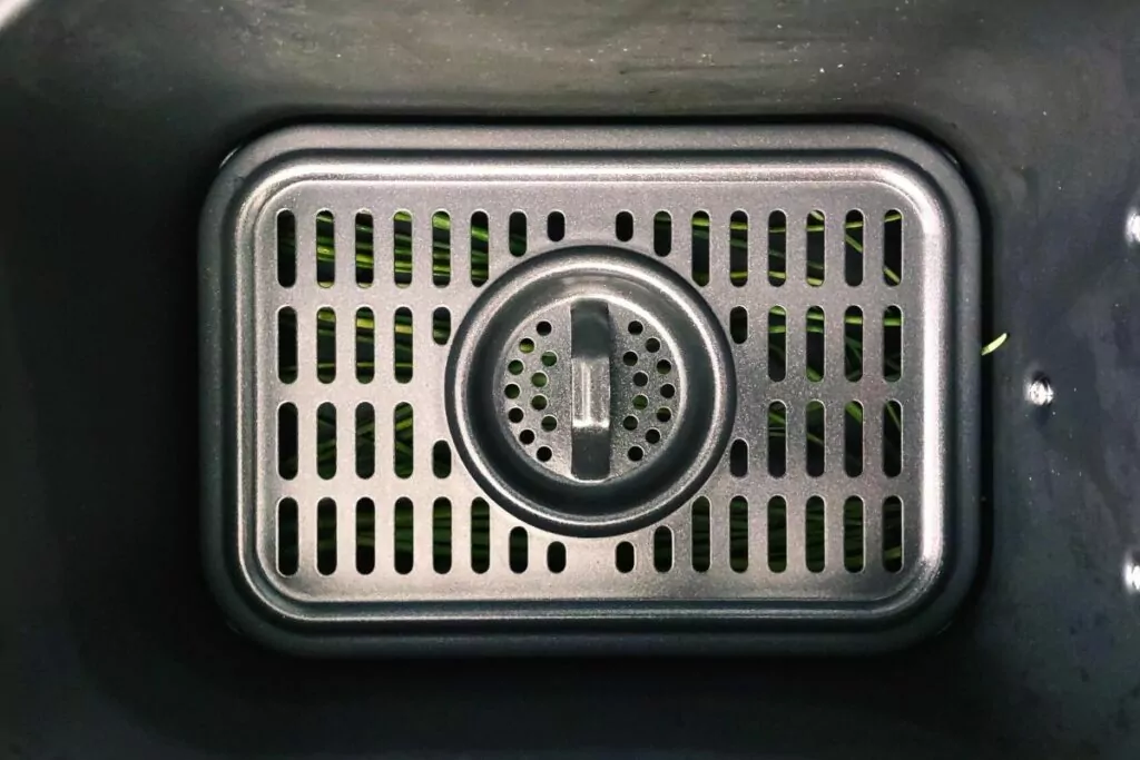 cover fresh chives with rack to prevent them blowing around the air fryer