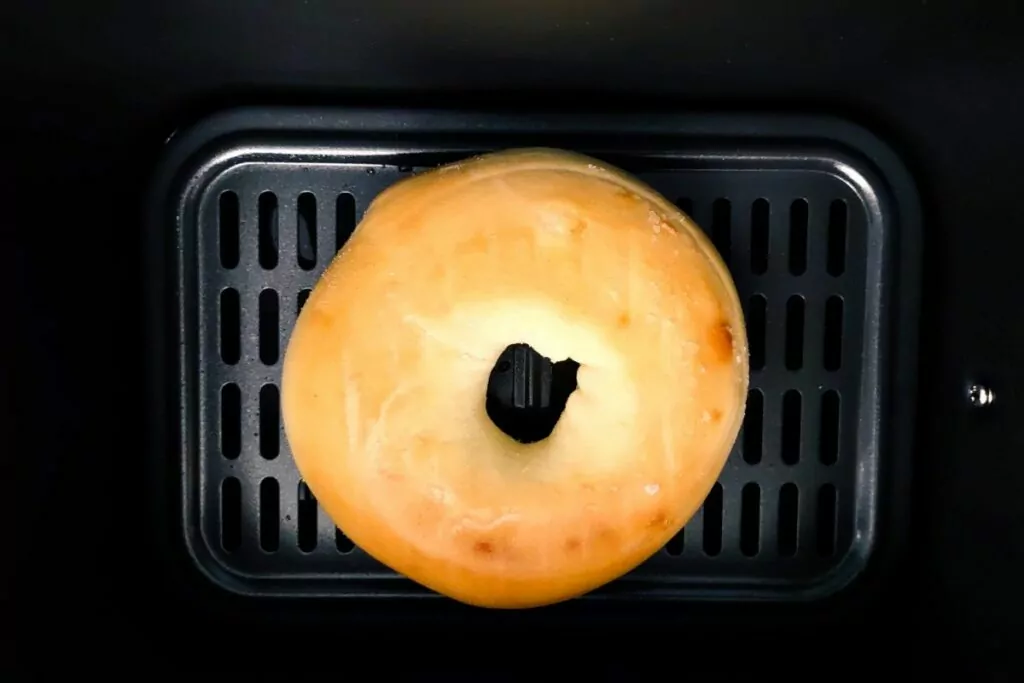place frozen bagel in air fryer basket