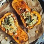 chickpea and sage stuffed butternut squash with hands theveganlarder