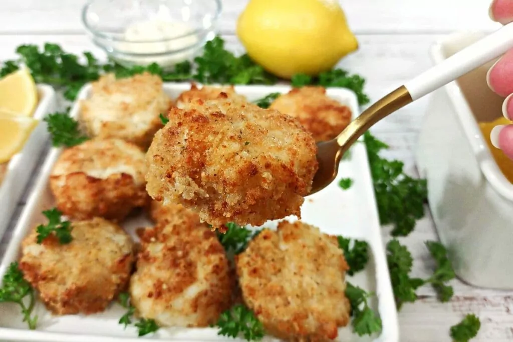 panko breaded scallop on a fork