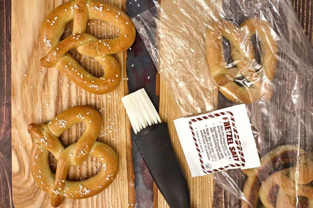 brush frozen soft pretzels with water and sprinkle salt