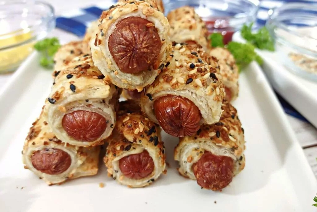 air fryer pigs in a blanket stacked up in a pyramid
