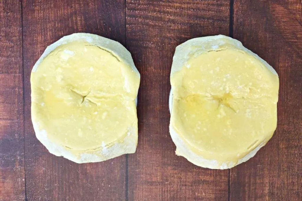 brush the top of the puff pastry with a beaten egg