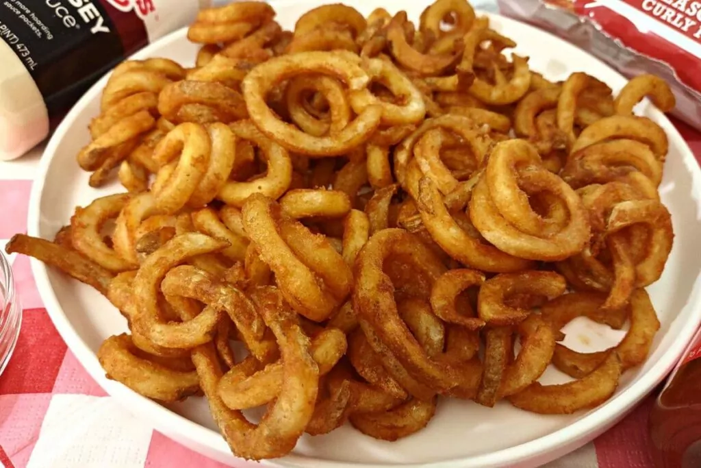quick frozen air fryer arbys curly fries on a plate