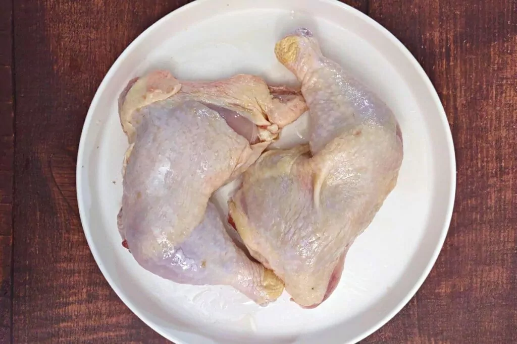 rub olive oil into chicken