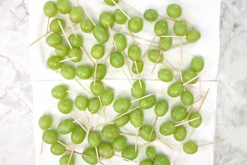 stick toothpicks in your cleaned grapes
