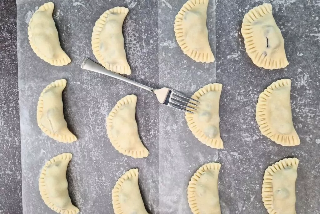 use a fork to crimp the edges of your dough closed
