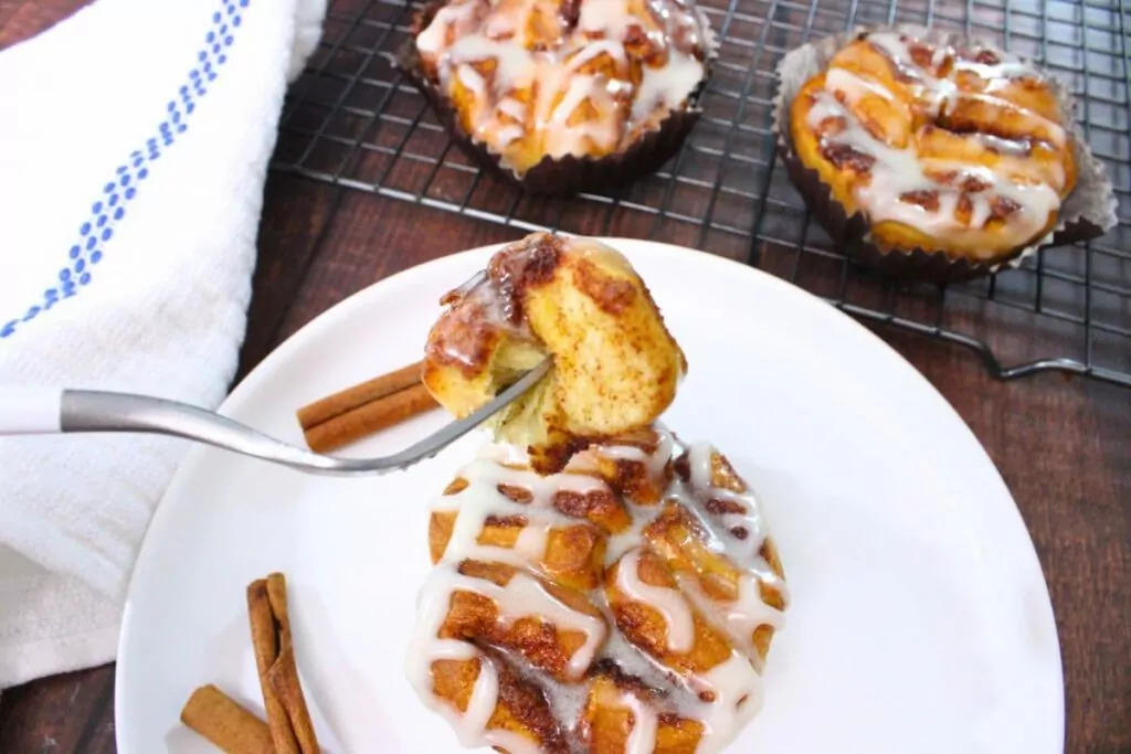 forkful of warm and delicious cinnabon mini bite