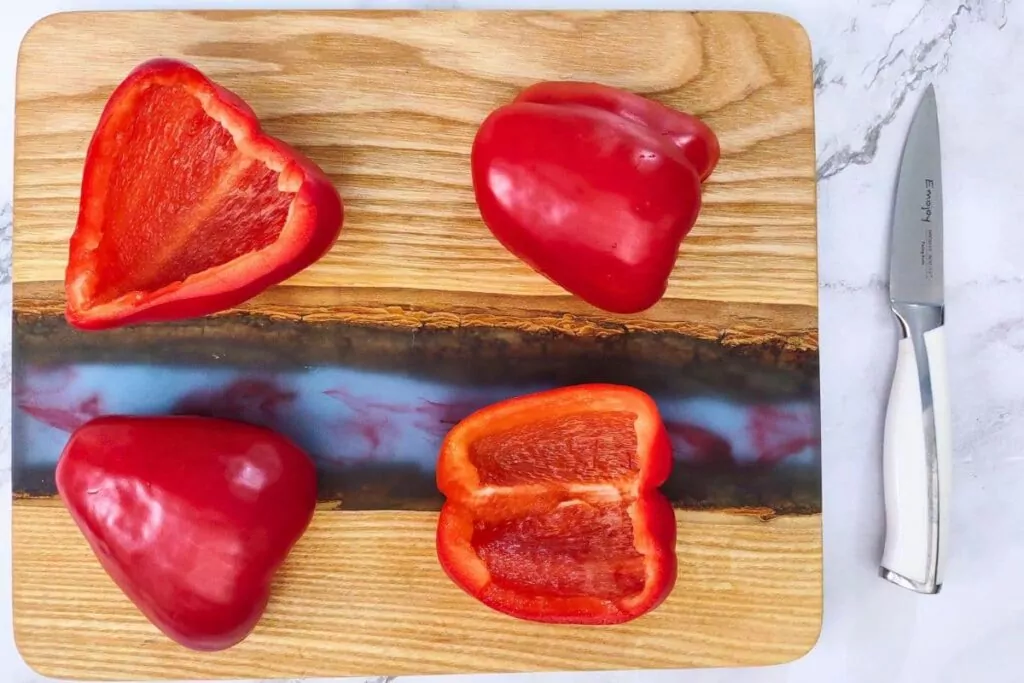 remove the seeds from your red peppers and slice them evenly