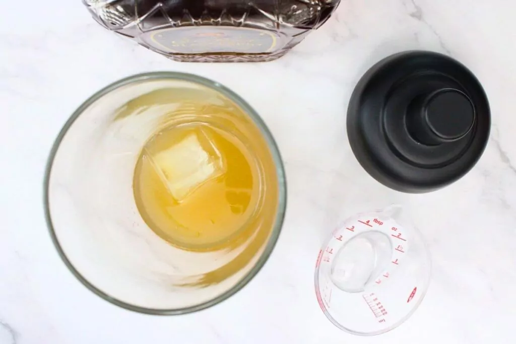 add blackberry whiskey sour ingredients to shaker with ice