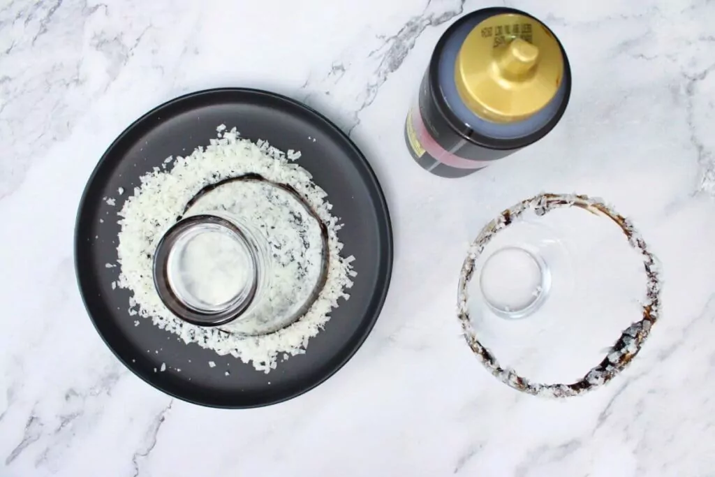 rim your glass with chocolate syrup and shredded coconut