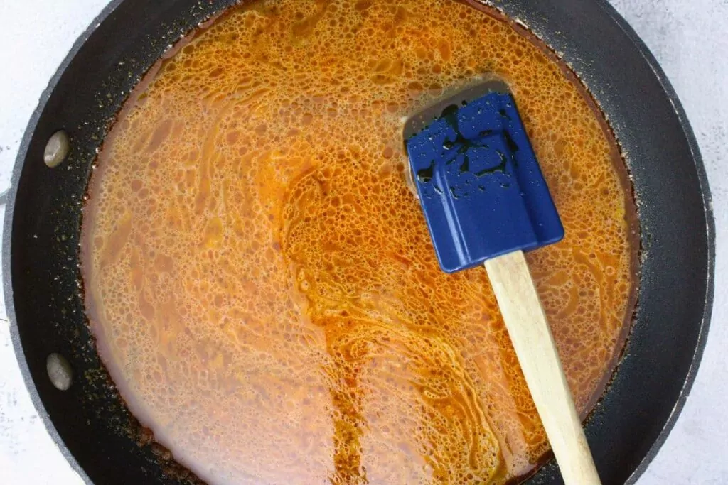 add cornstarch to pan until a paste forms and slowly pour in vegetable stock