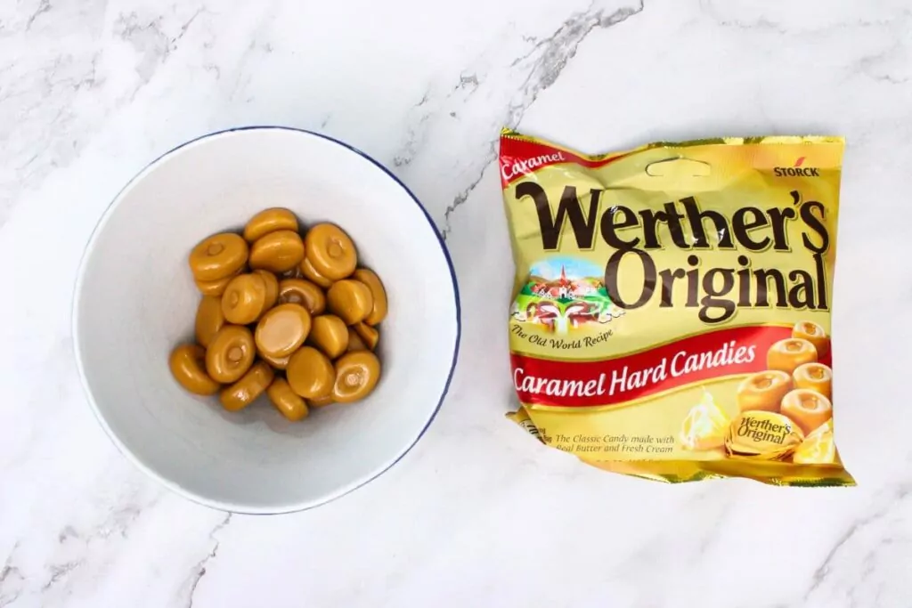 unwrap caramel candies and place them in a heat resistant bowl
