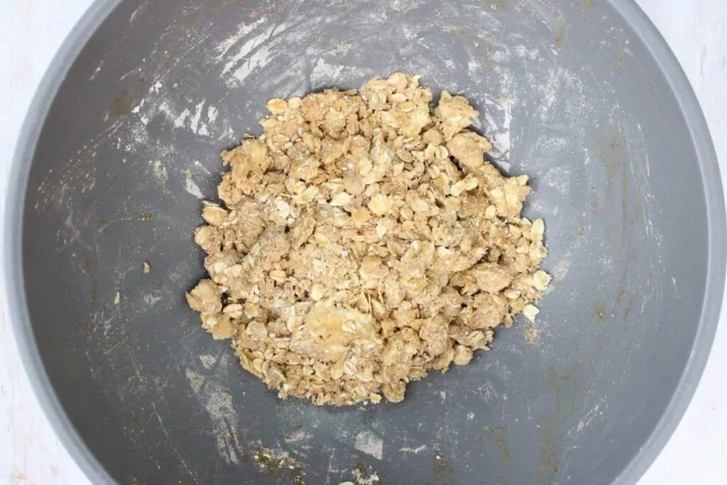make oat topping with oats, brown sugar, flour, and cinnamon