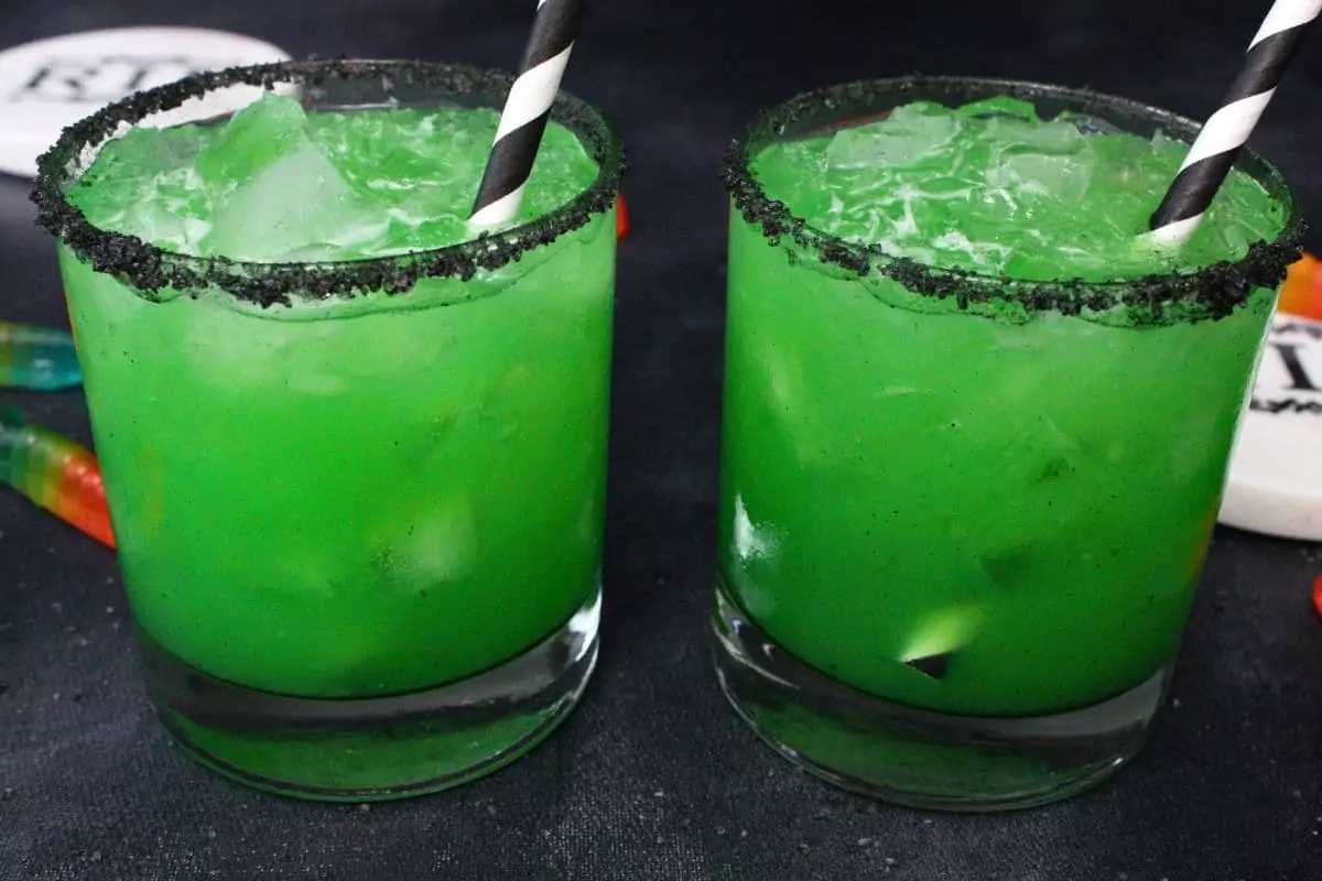 closeup view of two beetlejuice cocktails for halloween