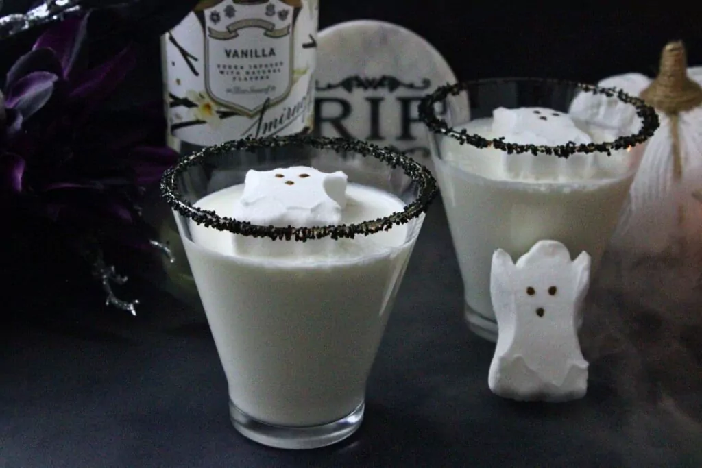 two ghost martinis in front of a vanilla vodka bottle