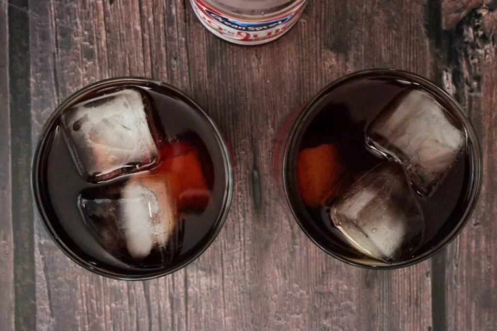 pour cranberry juice over apple whiskey