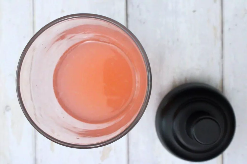 add pink whitney vodka, lemon juice, orange flavor liqueur, simple syrup, and pink lemonade in cocktail shaker