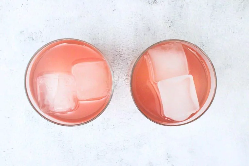 add ice to watermelon gin fizz glass