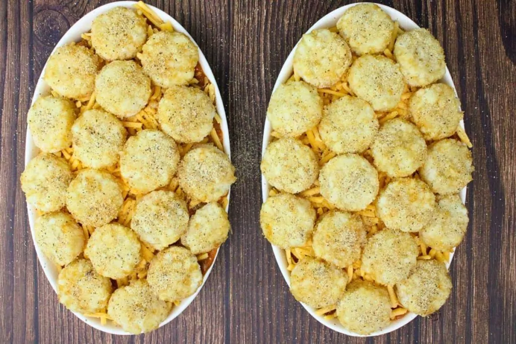 add tater tot crowns over shredded cheese