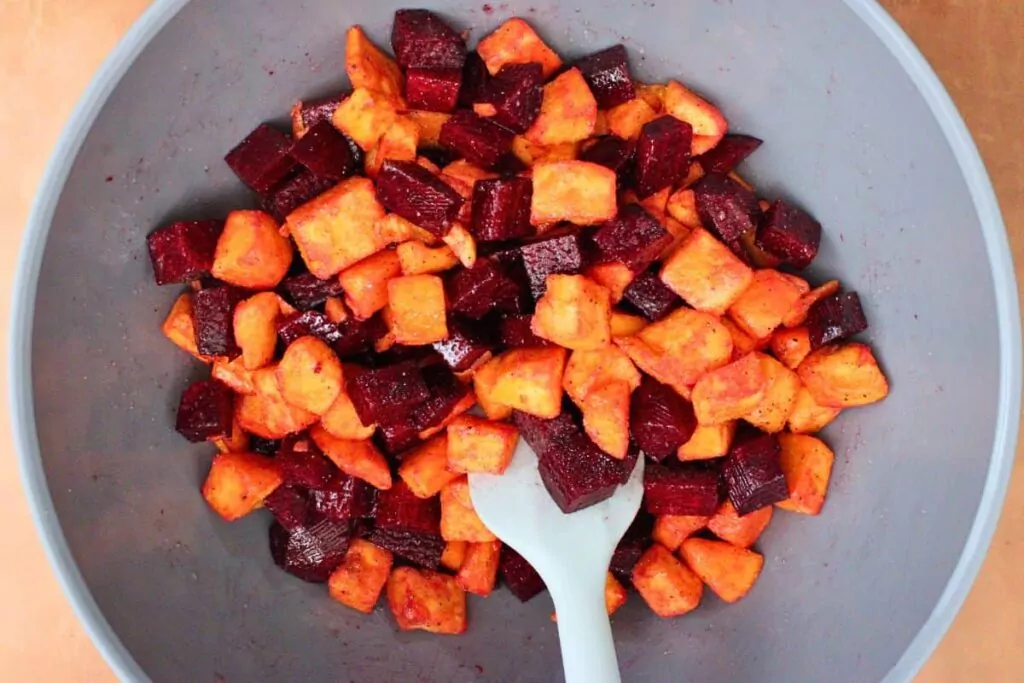 toss diced sweet potatoes and beets in olive oil, salt, and pepper