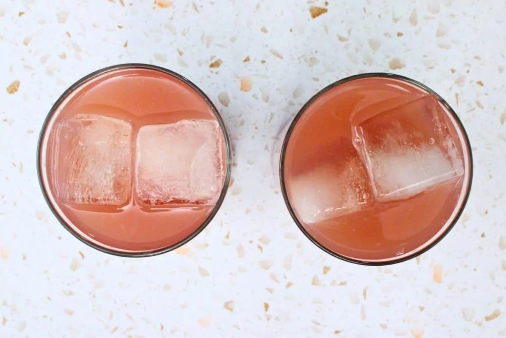 add vodka, cranberry juice, and grapefruit juice to glass