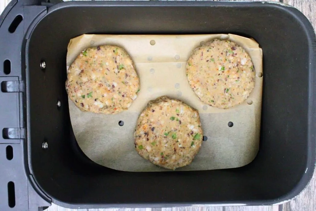 place black eyed pea fritters in air fryer basket