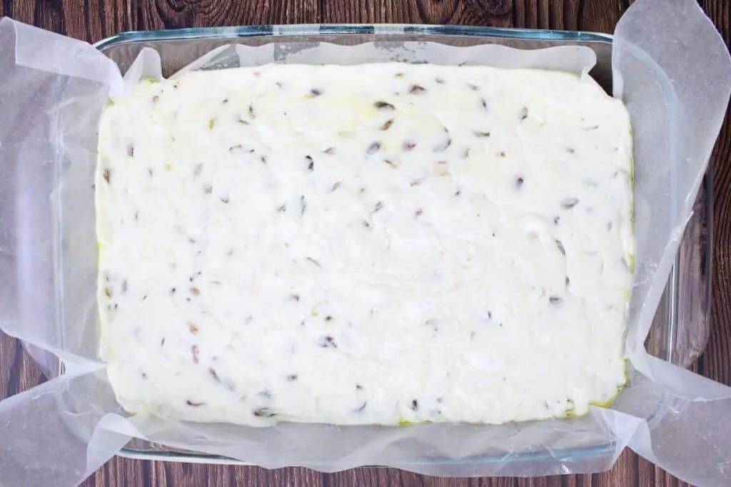 pour pistachio nougat mixture into prepared pan