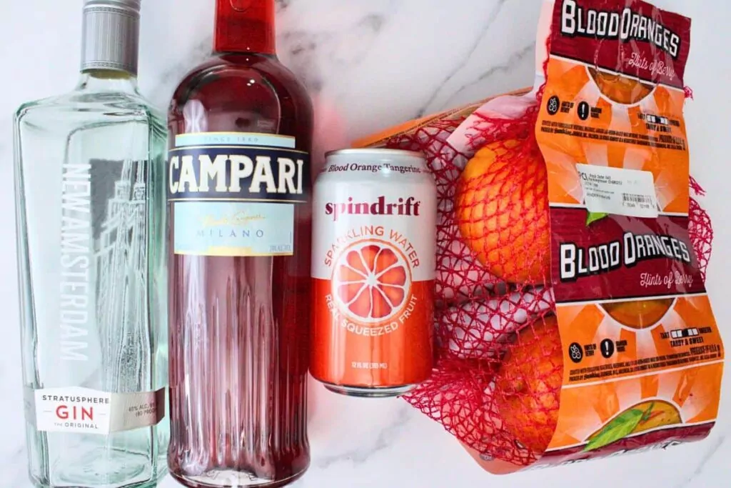 ingredients to make blood orange gin fizz cocktail