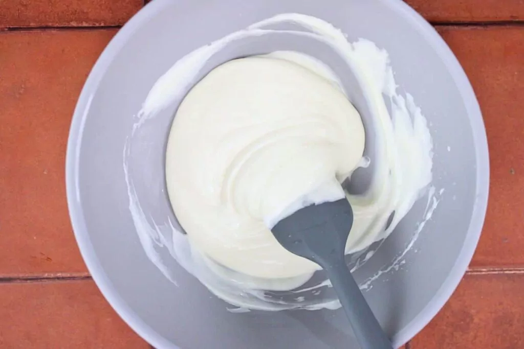 while corn is cooking combine lime juice, mayo, and crema in a small bowl