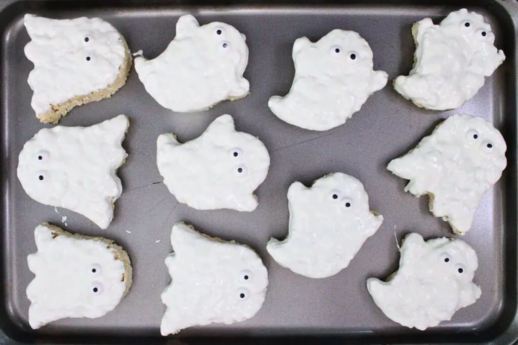 dip ghost rice krispies in melted chocolate and add candy eyes